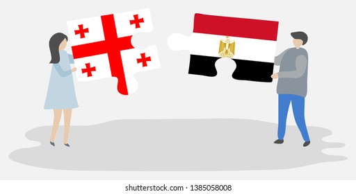Couple holding two puzzles pieces with Georgian and Egyptian flags. Georgia and Egypt national symbols together.