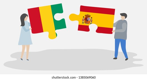 Couple holding two puzzles pieces with Guinean and Spanish flags. Guinea and Spain national symbols together.