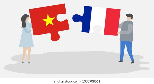 Couple holding two puzzles pieces with Vietnamese and French flags. Vietnam and France national symbols together.