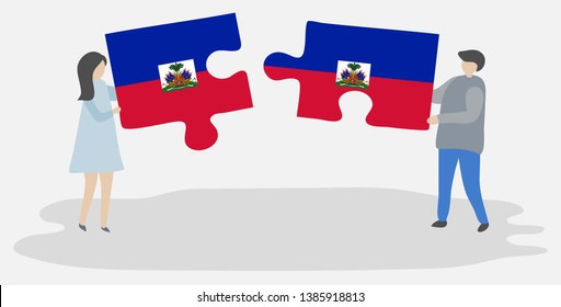 Couple holding two puzzles pieces with Haitian and Haitian flags. Haiti and Haiti national symbols together.