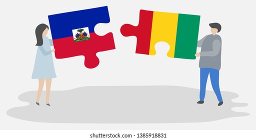 Couple holding two puzzles pieces with Haitian and Guinean flags. Haiti and Guinea national symbols together.