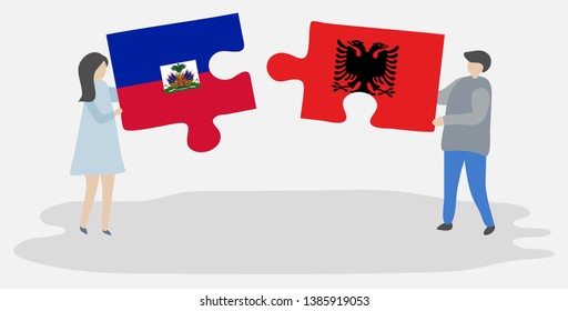 Couple holding two puzzles pieces with Haitian and Albanian flags. Haiti and Albania national symbols together.