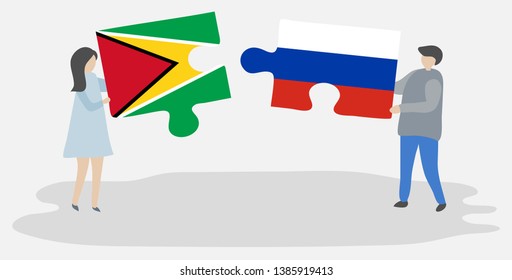 Couple holding two puzzles pieces with Guyanese and Russian flags. Guyana and Russia national symbols together.