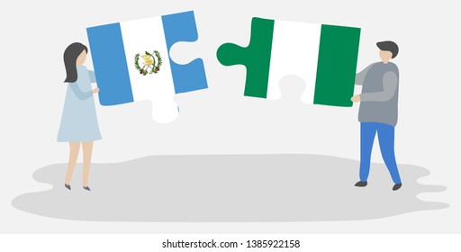 Couple holding two puzzles pieces with Guatemalan and Nigerian flags. Guatemala and Nigeria national symbols together.