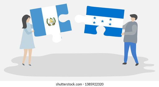 Couple holding two puzzles pieces with Guatemalan and Honduran flags. Guatemala and Honduras national symbols together.