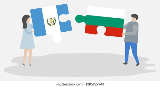Couple holding two puzzles pieces with Guatemalan and Bulgarian flags. Guatemala and Bulgaria national symbols together.
