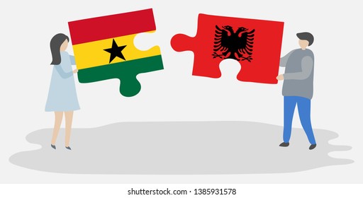 Couple holding two puzzles pieces with Ghanaian and Albanian flags. Ghana and Albania national symbols together.