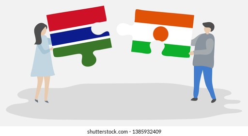 Couple holding two puzzles pieces with Gambian and Nigerien flags. Gambia and Niger national symbols together.
