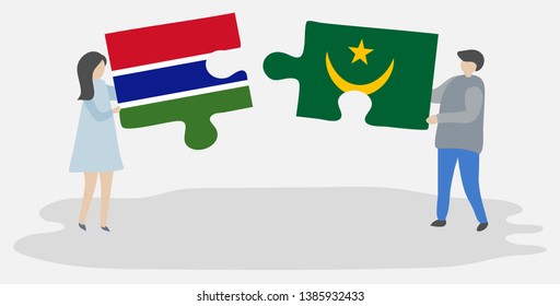 Couple holding two puzzles pieces with Gambian and Mauritanian flags. Gambia and Mauritania national symbols together.