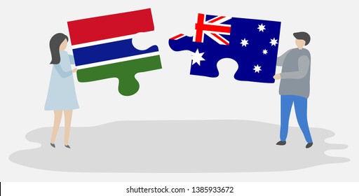 Couple holding two puzzles pieces with Gambian and Australian flags. Gambia and Australia national symbols together.