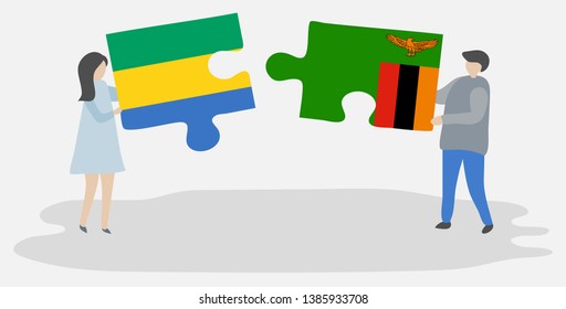 Couple holding two puzzles pieces with Gabonese and Zambian flags. Gabon and Zambia national symbols together.