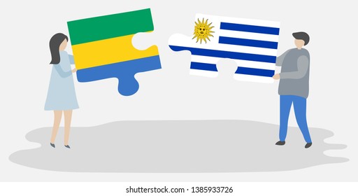 Couple holding two puzzles pieces with Gabonese and Uruguayan flags. Gabon and Uruguay national symbols together.