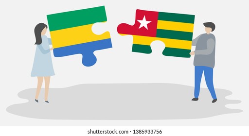 Couple holding two puzzles pieces with Gabonese and Togolese flags. Gabon and Togo national symbols together.