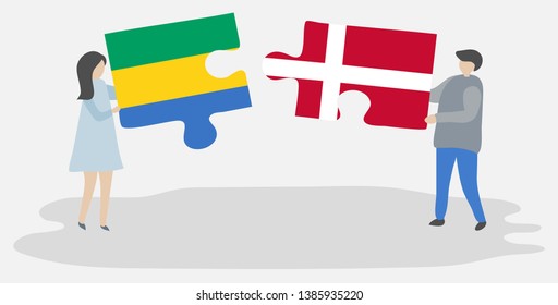 Couple holding two puzzles pieces with Gabonese and Danish flags. Gabon and Denmark national symbols together.