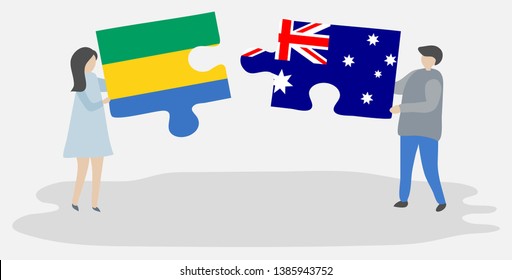 Couple holding two puzzles pieces with Gabonese and Australian flags. Gabon and Australia national symbols together.