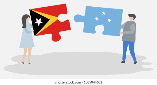Couple holding two puzzles pieces with Timorese and Micronesian flags. East Timor and Micronesia national symbols together.