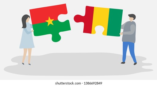 Couple holding two puzzles pieces with Burkinabe and Guinean flags. Burkina Faso and Guinea national symbols together.
