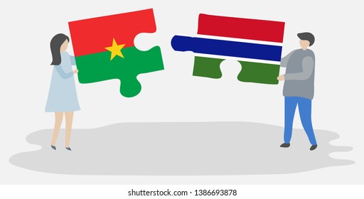 Couple holding two puzzles pieces with Burkinabe and Gambian flags. Burkina Faso and Gambia national symbols together.