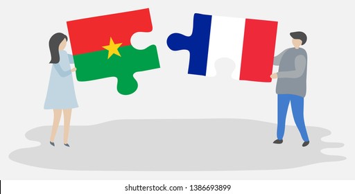 Couple holding two puzzles pieces with Burkinabe and French flags. Burkina Faso and France national symbols together.