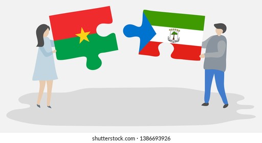 Couple holding two puzzles pieces with Burkinabe and Equatorial Guinean flags. Burkina Faso and Equatorial Guinea national symbols together.