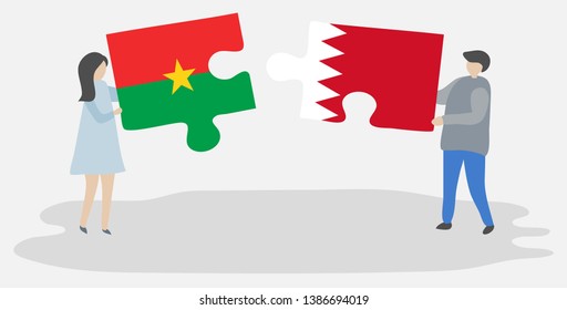 Couple holding two puzzles pieces with Burkinabe and Bahraini flags. Burkina Faso and Bahrain national symbols together.