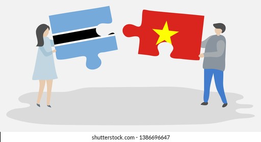 Couple holding two puzzles pieces with Motswana and Vietnamese flags. Botswana and Vietnam national symbols together.
