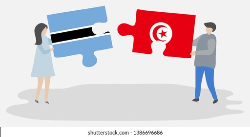 Couple holding two puzzles pieces with Motswana and Tunisian flags. Botswana and Tunisia national symbols together.
