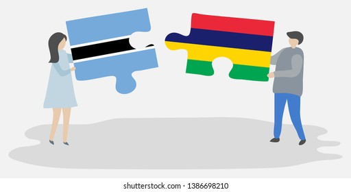 Couple holding two puzzles pieces with Motswana and Mauritian flags. Botswana and Mauritius national symbols together.