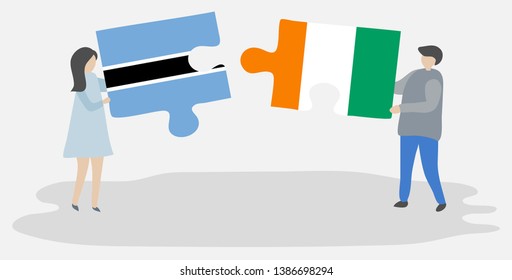 Couple holding two puzzles pieces with Motswana and Ivorian flags. Botswana and Ivory Coast national symbols together.