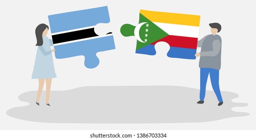 Couple holding two puzzles pieces with Motswana and Comoran flags. Botswana and Comoros national symbols together.