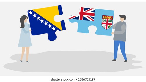 Couple holding two puzzles pieces with Bosnian and Fijian flags. Bosnia and Herzegovina and Fiji national symbols together.
