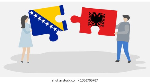 Couple holding two puzzles pieces with Bosnian and Albanian flags. Bosnia and Herzegovina and Albania national symbols together.