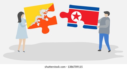 Couple holding two puzzles pieces with Bhutanese and North Korean flags. Bhutan and North Korea national symbols together.