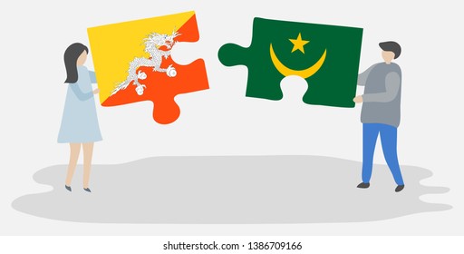 Couple holding two puzzles pieces with Bhutanese and Mauritanian flags. Bhutan and Mauritania national symbols together.