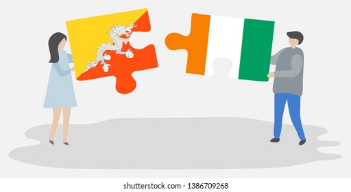 Couple holding two puzzles pieces with Bhutanese and Ivorian flags. Bhutan and Ivory Coast national symbols together.
