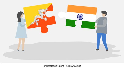 Couple holding two puzzles pieces with Bhutanese and Indian flags. Bhutan and India national symbols together.