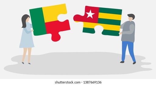 Couple holding two puzzles pieces with Beninese and Togolese flags. Benin and Togo national symbols together.