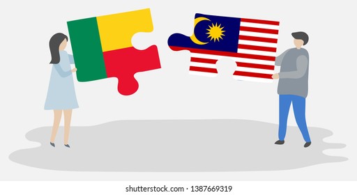 Couple holding two puzzles pieces with Beninese and Malaysian flags. Benin and Malaysia national symbols together.