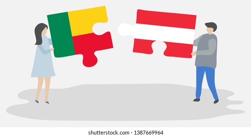 Couple holding two puzzles pieces with Beninese and Austrian flags. Benin and Austria national symbols together.
