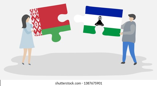 Couple holding two puzzles pieces with Belarusian and Basotho flags. Belarus and Lesotho national symbols together.