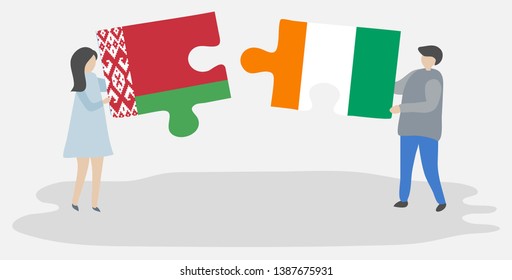 Couple holding two puzzles pieces with Belarusian and Ivorian flags. Belarus and Ivory Coast national symbols together.