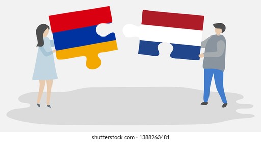 Couple holding two puzzles pieces with Armenian and Dutch flags. Armenia and Netherlands national symbols together.