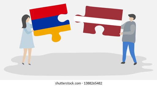 Couple holding two puzzles pieces with Armenian and Latvian flags. Armenia and Latvia national symbols together.