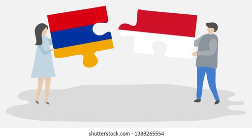 Couple holding two puzzles pieces with Armenian and Indonesian flags. Armenia and Indonesia national symbols together.