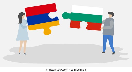 Couple holding two puzzles pieces with Armenian and Bulgarian flags. Armenia and Bulgaria national symbols together.