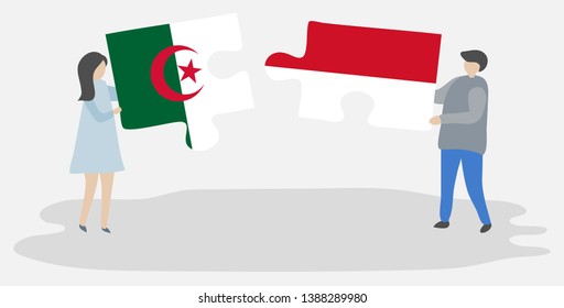 Couple holding two puzzles pieces with Algerian and Indonesian flags. Algeria and Indonesia national symbols together.