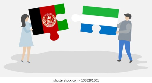 Couple holding two puzzles pieces with Afghan and Sierra Leonean flags. Afghanistan and Sierra Leone national symbols together.