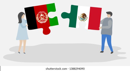 Couple holding two puzzles pieces with Afghan and Mexican flags. Afghanistan and Mexico national symbols together.
