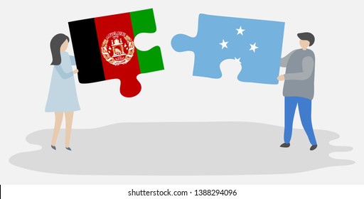 Couple holding two puzzles pieces with Afghan and Micronesian flags. Afghanistan and Micronesia national symbols together.