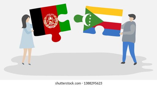 Couple holding two puzzles pieces with Afghan and Comoran flags. Afghanistan and Comoros national symbols together.